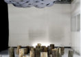 Shabu Mwangi, Probosis Lenses, imprinted fabric, wood logs, chains, 250x200x200cm
